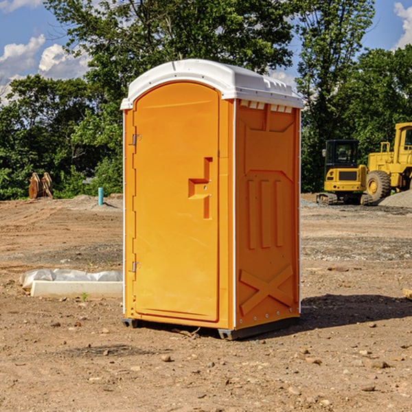 how often are the portable restrooms cleaned and serviced during a rental period in Hext